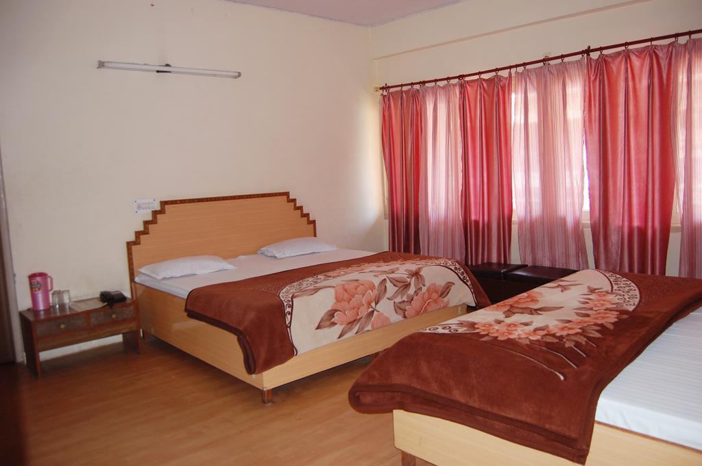 Hotel Mansarover International Haridwār Quarto foto